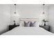Serene main bedroom featuring minimalist decor, modern lighting, and a calming ambiance at 6213 64Th N Way, Pinellas Park, FL 33781