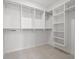 Spacious walk-in closet with ample shelving and storage, providing organization and convenience at 6213 64Th N Way, Pinellas Park, FL 33781