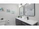 Bathroom featuring double sinks, sleek fixtures, and modern decor at 6291 63Rd N St, Pinellas Park, FL 33781