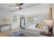 Bedroom with bright natural light, ceiling fan, and stylish furnishings at 6291 63Rd N St, Pinellas Park, FL 33781