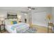 Bedroom with bright natural light, ceiling fan, barn door, and closet at 6291 63Rd N St, Pinellas Park, FL 33781