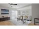 Spacious living room featuring natural light, hardwood floors, and modern decor at 6291 63Rd N St, Pinellas Park, FL 33781