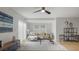 Bright living room with modern furniture, hardwood floors and big windows at 6291 63Rd N St, Pinellas Park, FL 33781