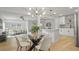 Bright living area with open floor plan, dining space, and a modern kitchen at 6291 63Rd N St, Pinellas Park, FL 33781