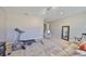 Bonus room featuring a treadmill, chair, and a black mirror at 6640 Park Strand Dr, Apollo Beach, FL 33572