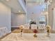 Dining room with chandelier, large table, and seating for eight at 6640 Park Strand Dr, Apollo Beach, FL 33572