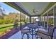 Comfortable screened patio with seating, perfect for enjoying the outdoor scenery at 6640 Park Strand Dr, Apollo Beach, FL 33572