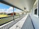 Covered back porch with a view to the backyard at 7705 W Four Pines Rd, Plant City, FL 33565