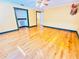 Spacious bedroom with hardwood floors, walk-in closet, and deer head decor at 7705 W Four Pines Rd, Plant City, FL 33565