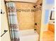 Shower includes a bathtub and a shower curtain at 7705 W Four Pines Rd, Plant City, FL 33565