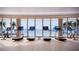 Bright fitness center with treadmills, exercise bikes and beautiful waterfront views at 805 S Gulfview Blvd # 305B, Clearwater, FL 33767