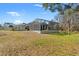 A screened-in patio enhances the beauty of the backyard at 9911 Mendel Dr, New Port Richey, FL 34654