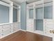 Spacious walk-in closet features custom storage solutions, including shelves and drawers, to maximize organization at 9911 Mendel Dr, New Port Richey, FL 34654