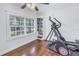 Bonus room with hardwood floors, an exercise machine, and a window overlooking the neighborhood at 1061 45Th N Ave, St Petersburg, FL 33703