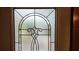 View of the leaded glass design detail on the front door at 1207 Pine Nw Ave, Largo, FL 33770