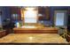 View of the kitchen featuring spacious countertops, a double sink, and upper cabinetry at 1207 Pine Nw Ave, Largo, FL 33770