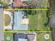 Aerial view of a home highlighting its waterfront location, large lot and outdoor patio at 1230 75Th N Ave, St Petersburg, FL 33702