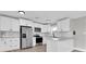 Well-lit kitchen boasting stainless steel appliances and white subway tile backsplash at 1230 75Th N Ave, St Petersburg, FL 33702
