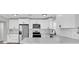 Modern kitchen featuring stainless steel appliances and white cabinetry at 1230 75Th N Ave, St Petersburg, FL 33702