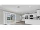 Modern kitchen featuring stainless steel appliances and white cabinetry at 1230 75Th N Ave, St Petersburg, FL 33702