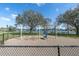 Neighborhood park featuring a playground and lake views at 1230 75Th N Ave, St Petersburg, FL 33702