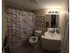 Full bathroom with a shower and tub combo, standard toilet, sink, and vanity at 12413 Oak Cedar Pl # 201, Tampa, FL 33612