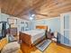 Cozy bedroom with wood floors, and a comfortable bed at 12950 Lincoln Rd, Riverview, FL 33578
