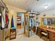 An organizing closet with built in storage spaces and vanity at 12950 Lincoln Rd, Riverview, FL 33578
