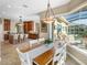 Dining area with backyard pool views at 13854 Thoroughbred Dr, Dade City, FL 33525