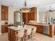 Elegant kitchen with custom cabinetry, countertops, and modern appliances at 13854 Thoroughbred Dr, Dade City, FL 33525