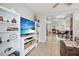 Open concept living room flows into dining room and kitchen at 1658 St Mary Dr, Dunedin, FL 34698