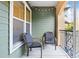 Outdoor balcony seating area offers fresh air and sunshine at 1910 E Palm Ave # 10301, Tampa, FL 33605