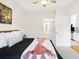 Comfortable bedroom leading into a bathroom and kitchen, providing ease and accessibility at 1910 E Palm Ave # 10301, Tampa, FL 33605