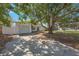 Charming single-story home featuring a spacious front yard and a private driveway with an attached garage at 1937 Palm Dr, Clearwater, FL 33763