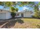 Charming single-story home with a well-maintained front yard and inviting entryway at 1937 Palm Dr, Clearwater, FL 33763
