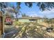 Expansive backyard with storage shed and mature trees, ideal for outdoor activities at 2259 Renton Ln, Spring Hill, FL 34609