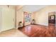 Bright living room with hardwood floors, a large window, and neutral wall colors at 2259 Renton Ln, Spring Hill, FL 34609