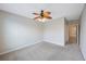 Neutral bedroom with carpet and a fan at 2747 Via Capri # 1122, Clearwater, FL 33764