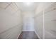 Walk-in closet featuring wire shelving along the perimeter at 2747 Via Capri # 1122, Clearwater, FL 33764