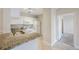 Well-lit kitchen features granite countertops and all white appliances at 2747 Via Capri # 1122, Clearwater, FL 33764