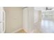 Open-concept living space features tile floors and sun-filled windows at 2747 Via Capri # 1122, Clearwater, FL 33764