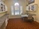 Bright office space with built-in bookshelves and desks, perfect for work or study at 2747 Via Capri # 1122, Clearwater, FL 33764