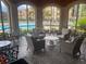 Comfortable outdoor lounge area near the pool, ideal for relaxing and socializing at 2747 Via Capri # 1122, Clearwater, FL 33764