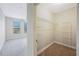 Walk-in closet with built in adjustable shelving at 2747 Via Capri # 1122, Clearwater, FL 33764