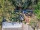 Aerial view of a back yard with grass and some patio furniture at 3054 Bright Dr, Holiday, FL 34691