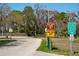 Various parking signs posted including 'boat trailer parking only', and 'parking requires payment' at 3054 Bright Dr, Holiday, FL 34691