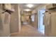 A well-organized walk-in closet features wire shelving and carpeted floors at 3832 Turning Tides Ter, Bradenton, FL 34208