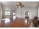 Spacious living room with hardwood floors, vaulted ceilings, and ample natural light at 5114 N Branch Ave, Tampa, FL 33603