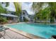 Wide angle of the pool and backyard at 5114 N Branch Ave, Tampa, FL 33603