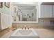This bathroom features a large mirror and a vanity at 5238 Vera St, Zephyrhills, FL 33542